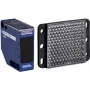 Fotoelektriline andur APC XUK1ARCNL2H61 — sinine plastkorpus, vahemik 0–7 m, 24–240 V AC sisend, 250 V väljund, 50×50×18 mm