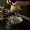 Fiskars All Steel mitmeotstarbeline pann ümmargune