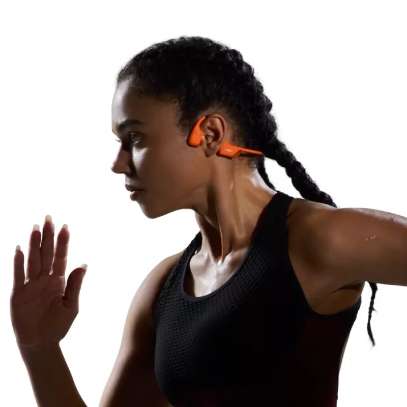 Luukonduktsiooniga peakomplekt Shokz OpenRun Pro 2 — binauraalne, juhtmevaba Bluetooth 5.3, IP55, 12 h esitusaeg, 150 mAh, oranž, kõrvahaak