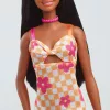 Barbie Fashionistas nukk nr 233 ruudulises lillelises midikleidis, mustade juustega