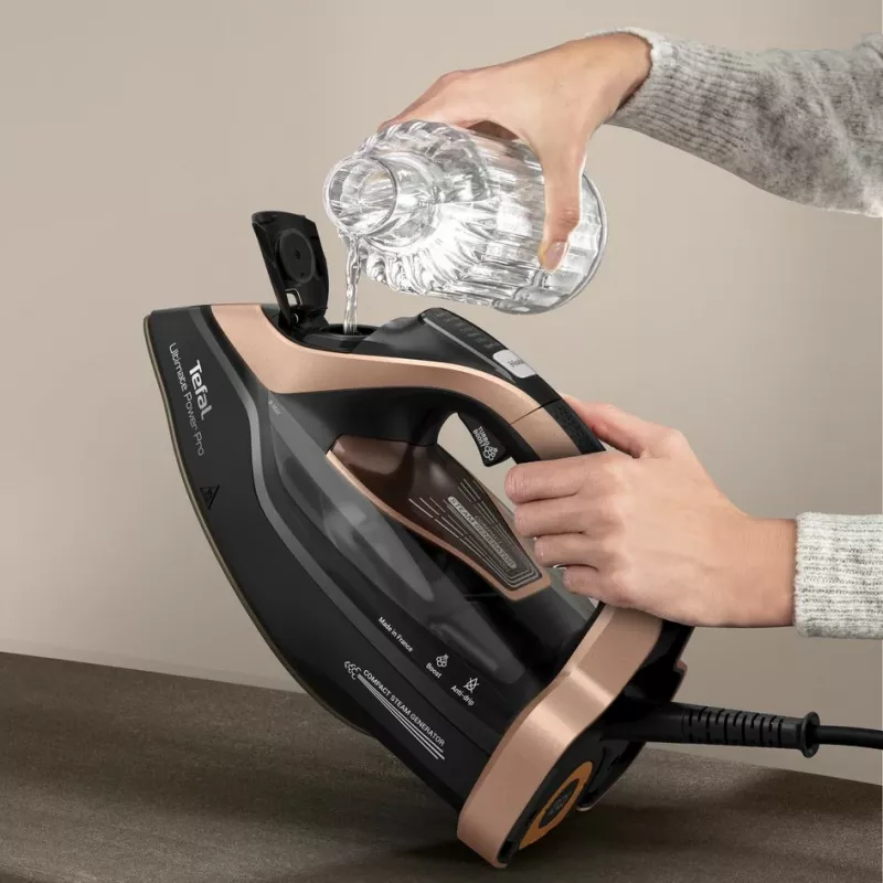 Tefal Ultimate Power Pro FV9E50 kuiv- ja aurutriikraud Durilium AirGlide Autoclean tallaga 3200 W must, vaskne