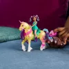 Mini nukukomplekt Usorteret Unicorn Academy Ava & Leaf Power of Friendship läbipaistva sadula ja 2 tarvikuga, 168 mm, plast