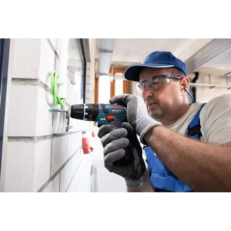 Püstolkäepidemega trell Bosch GSB 12V-15, 1300 p/min, 2 Ah aku