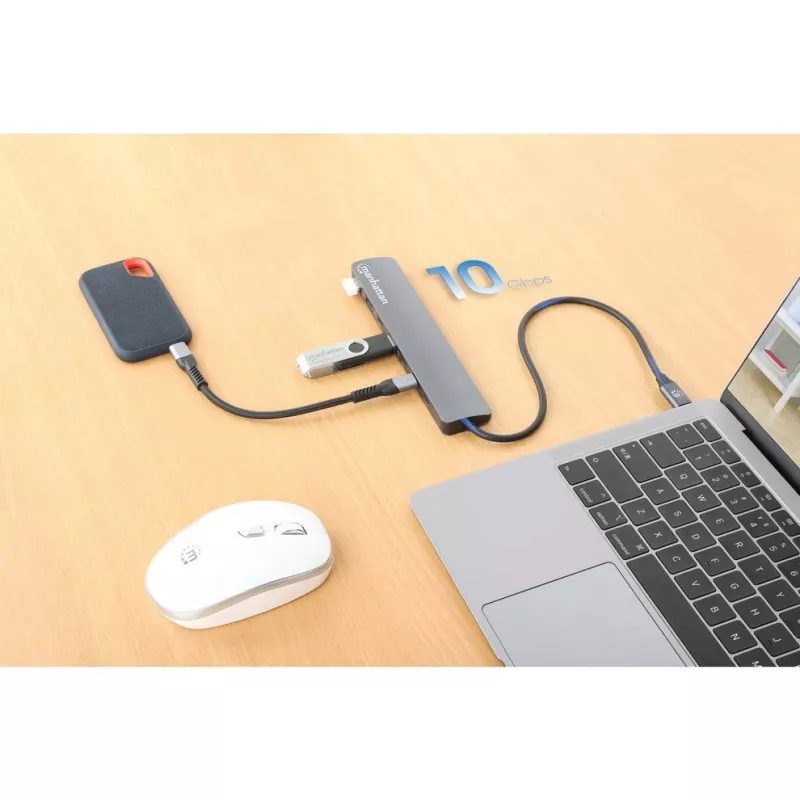 Manhattan USB-C dokk/jaotur, pordid (x7): USB-A (x3) ja USB-C (x4), toiteedastusega (PD) 100W – vajab välist USB-C laadijat (ei kuulu komplekti). USB-toitega (välist toiteplokki pole vaja), kui PD-d ei kasutata. Alumiinium.
