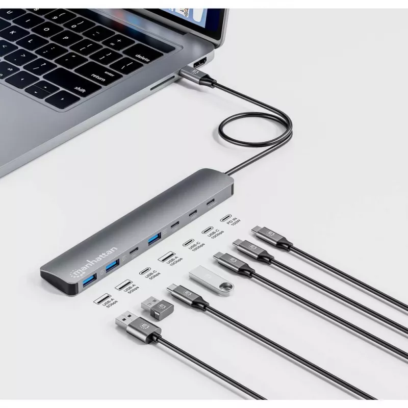 Manhattan USB-C dokk/jaotur, pordid (x7): USB-A (x3) ja USB-C (x4), toiteedastusega (PD) 100W – vajab välist USB-C laadijat (ei kuulu komplekti). USB-toitega (välist toiteplokki pole vaja), kui PD-d ei kasutata. Alumiinium.