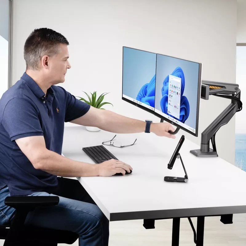 StarTech.com lauale kinnitatav kahe monitori hoob risttalaga, kuni 27-tollised ekraanid, VESA 75x75/100x100, max 33 naela/15 kg, C-klamber, täisliigendus, mehaaniline vedru, TAA