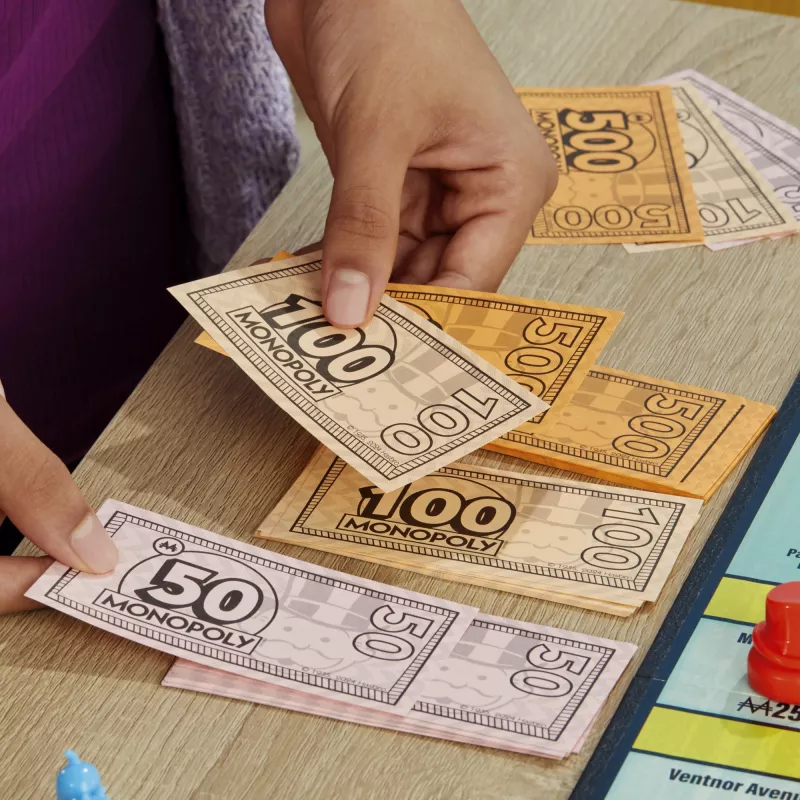Monopoly Knockout perepidude mäng, kiirelt mängitavad lauamängud alates 8. eluaastast, 2–8 mängijale, 20 min