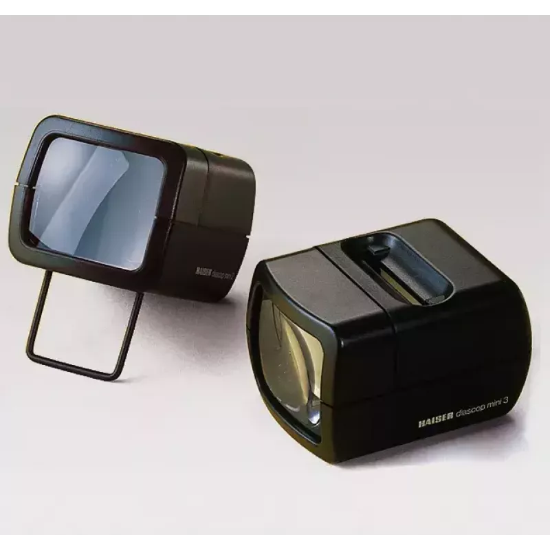 Slaidiprojektor KAISER 2010 — kompaktne 3× suurendus, 75×105×60 mm, 1,5 V aku