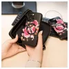 Evelatus Apple iPhone 14 Pro Max Nahkkate Tõmblukuga Lilledisain Must