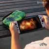 Hyperkin M07541-MTCN kõva kestaga ümbris, roheline, mitmevärviline, PEVA, Nintendo Switch Lite'ile, põrutuskindel, veekindel, kandekott