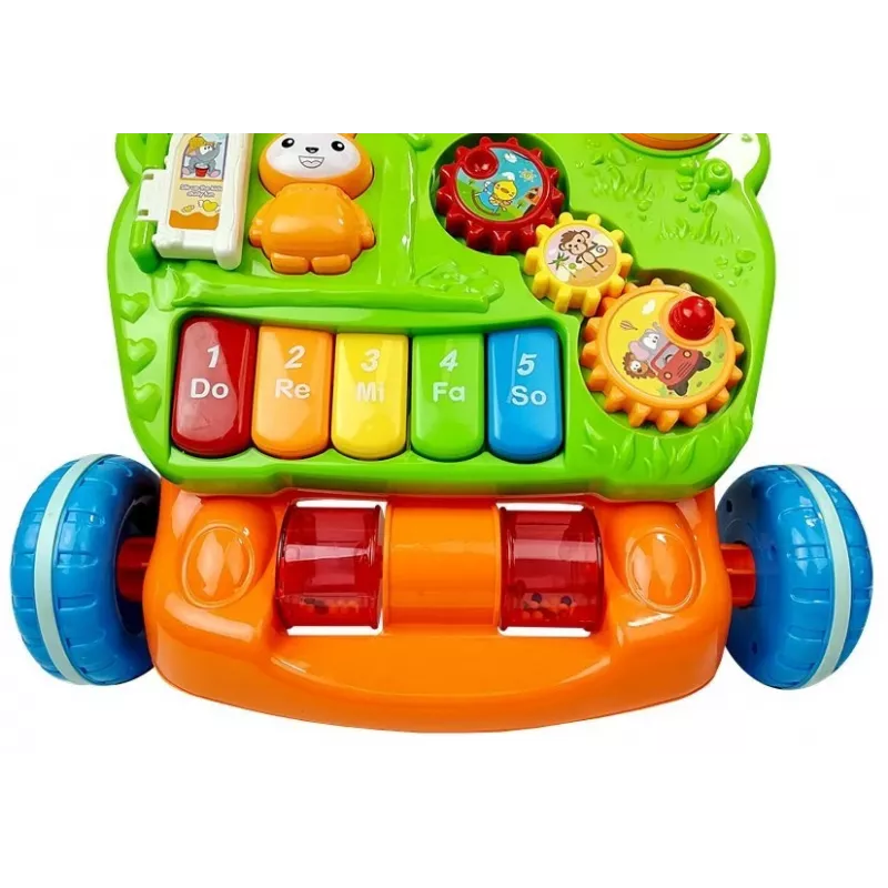 LEAN TOYS Hariv lükkeratas beebidele klaveriga