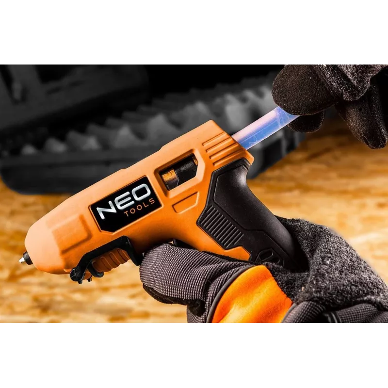 NEO Tools 17-083 20W Juhtmega kuumaliimipüstol tilkumisvastase otsikuga, 11mm liimipulkadega, integreeritud alusega, 230V, oranž/must