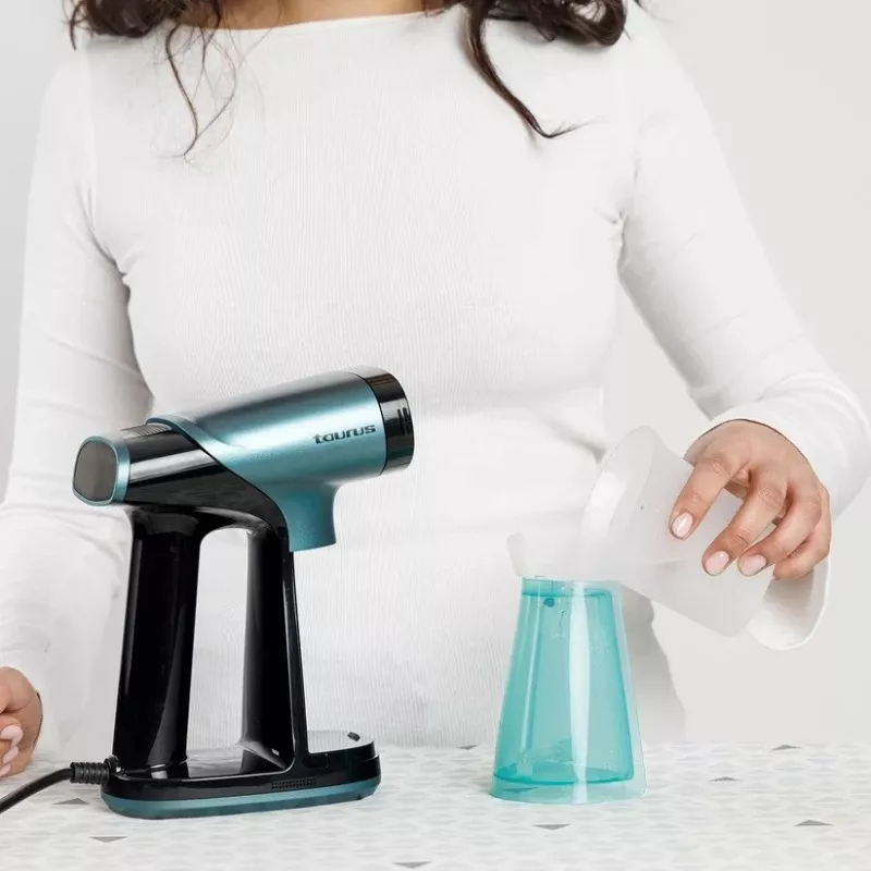 Taurus Sliding Care ProSuction aururõivaste auruti 1550 W 180 ml tsüaan